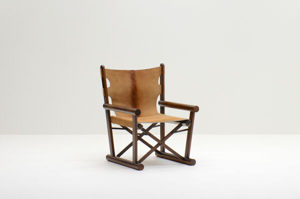 Fauteuil en peau de vache PL22 par Carlo Hauner & Martin Eisler pour OCA, Brésil 60s.