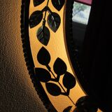 Round gold metal mirror, rose crown