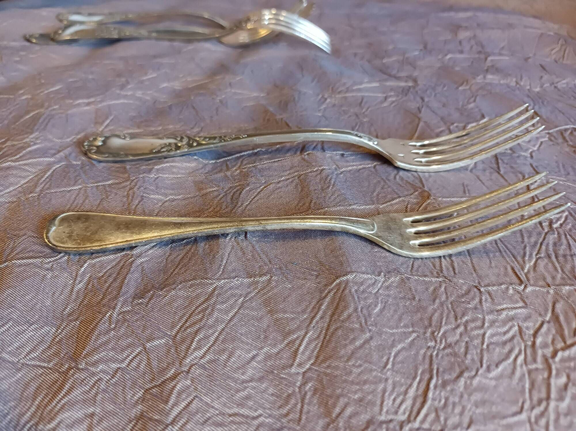 5 silver forks