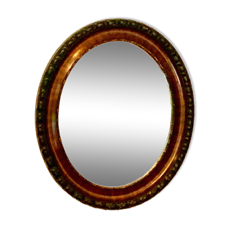 Oval beveled rosewood mirror