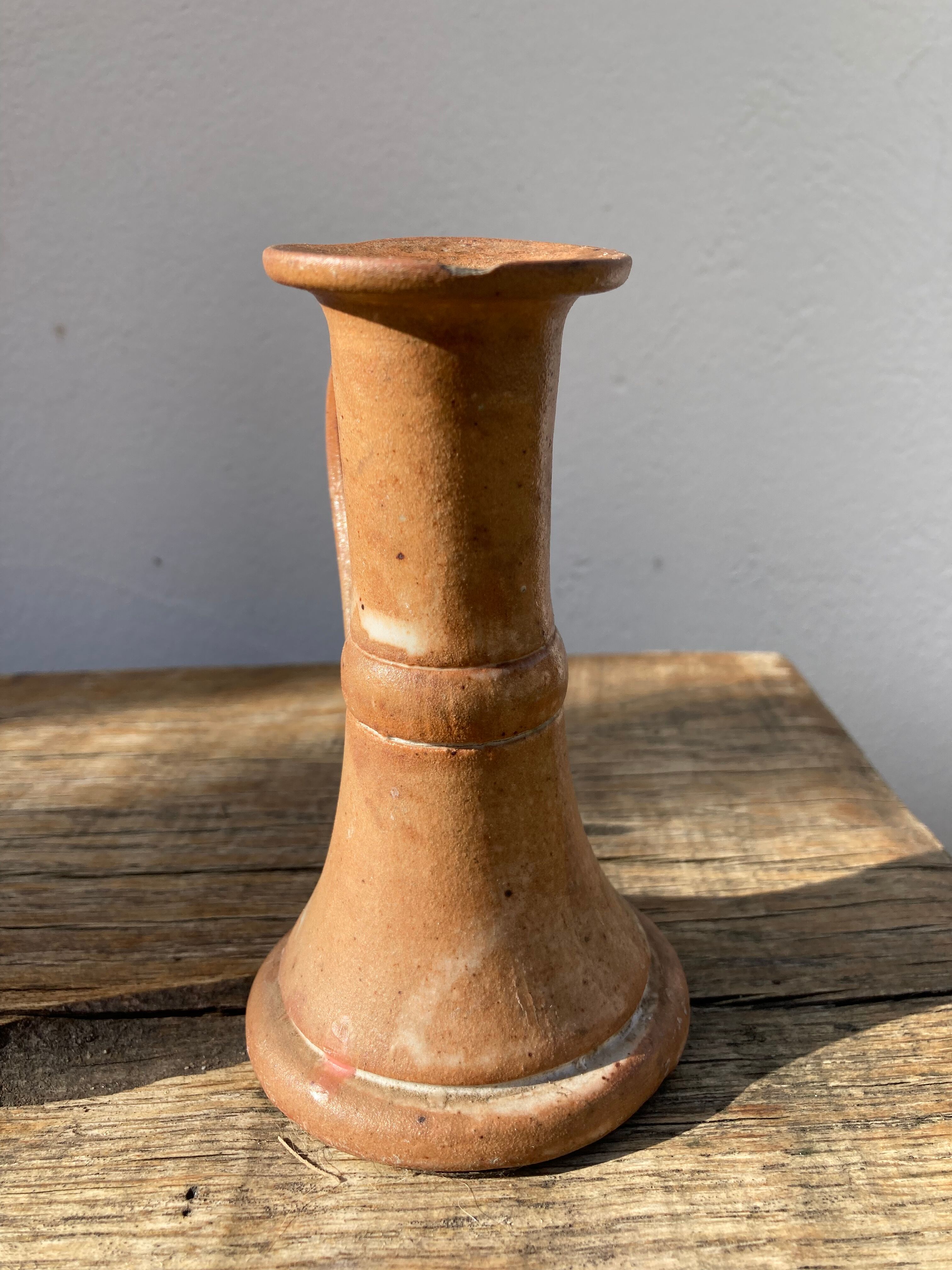 Candle holder in beige brown enamelled sandstone