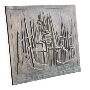 Plaque en fonte signée