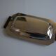 Art Deco serving dish in chrome metal with ebony handles.
