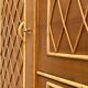 Rattan wardrobe with tapered legs from the 1960s.