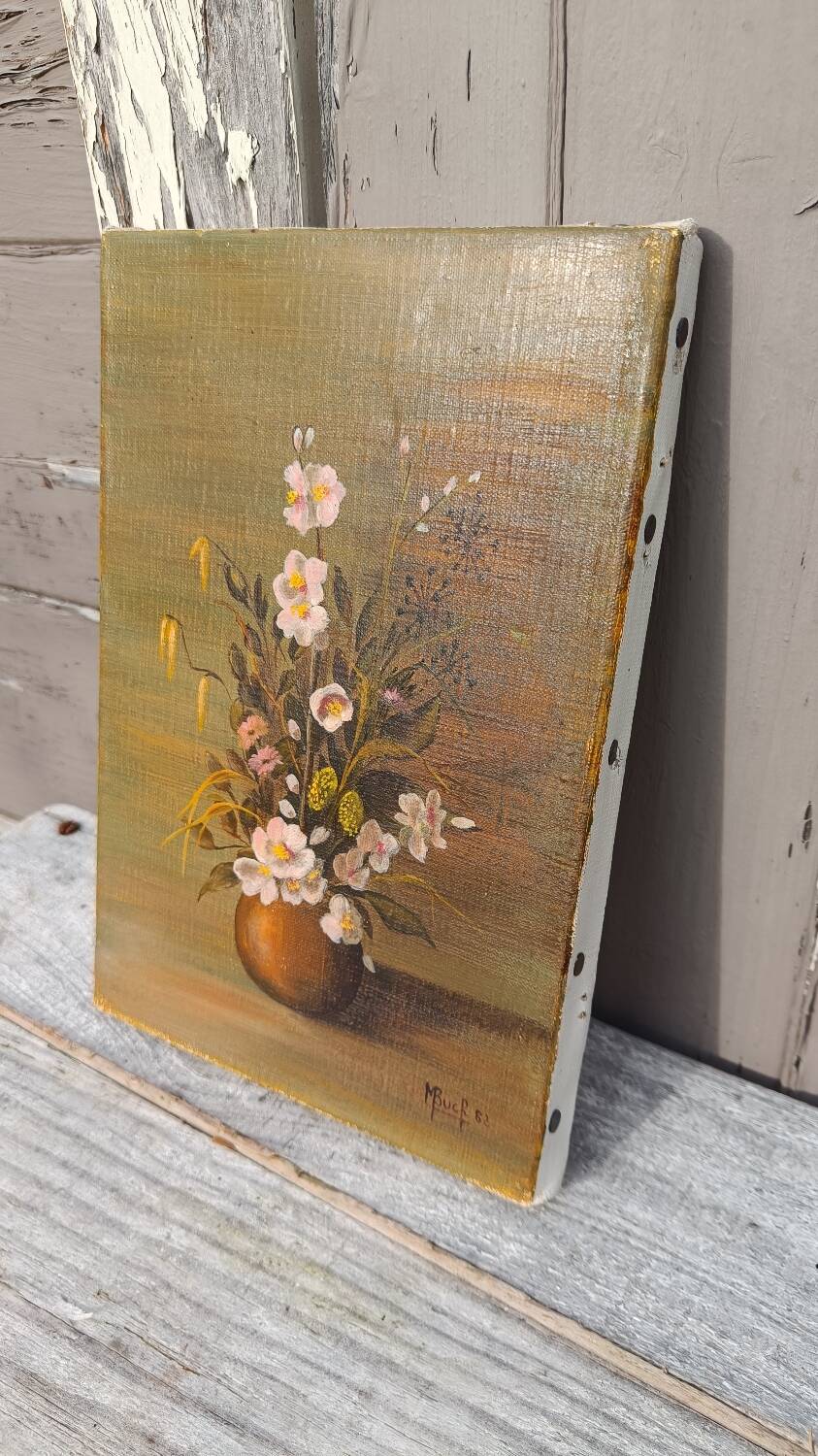 Canvas painting of a bouquet of flowers.