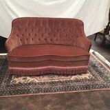 Pale pink tufted back toad sofa