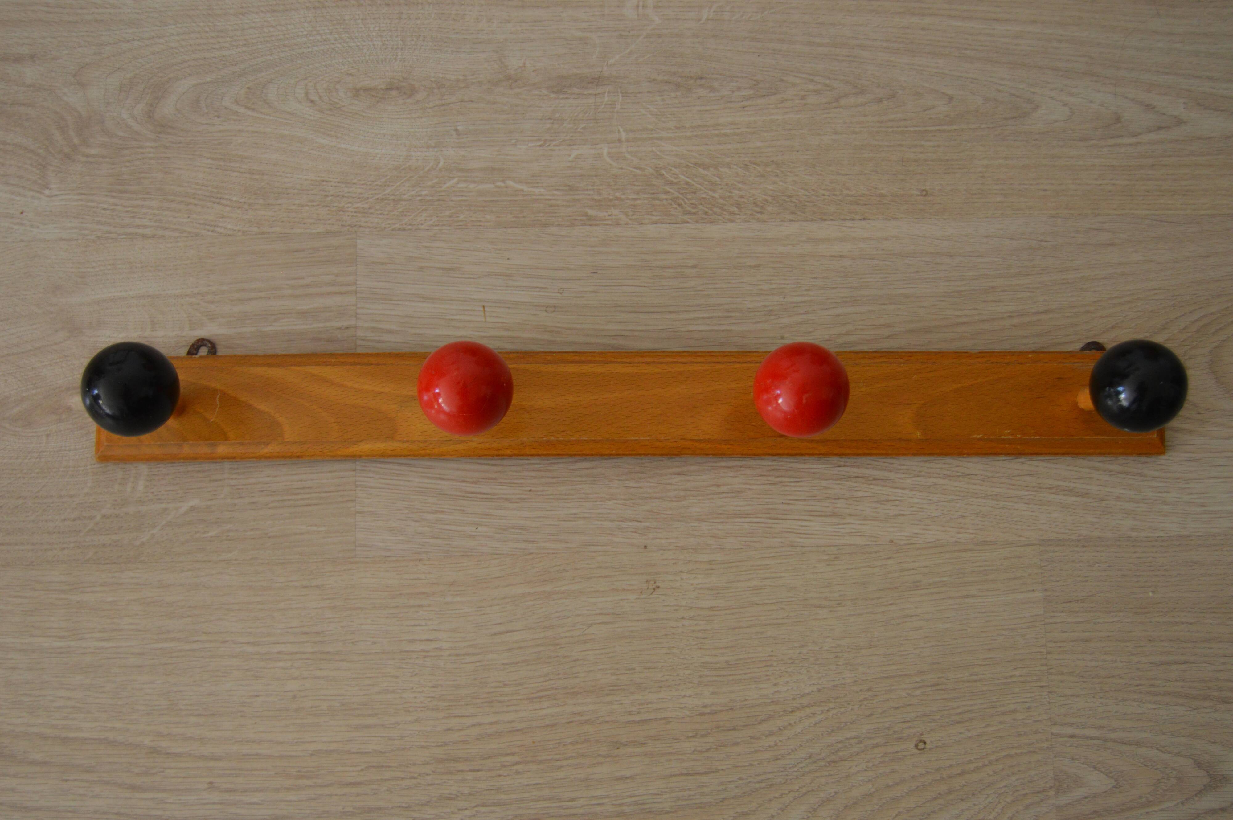 Vintage wooden hook with 4 racks painted red and black