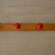Vintage wooden hook with 4 racks painted red and black