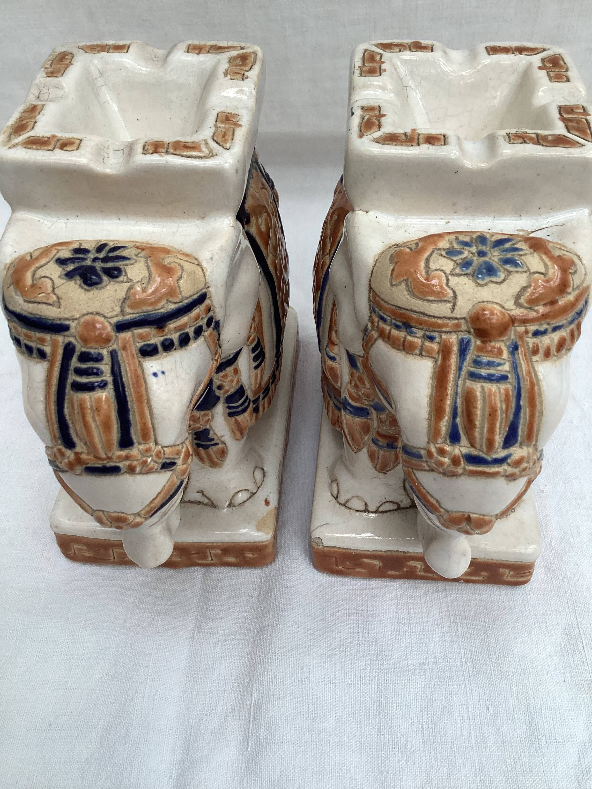 Pair of ceramic elephant ashtrays dimensions: height -14cm- width -13.5cm-