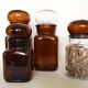 Set of 4 clear and brown glass jars
