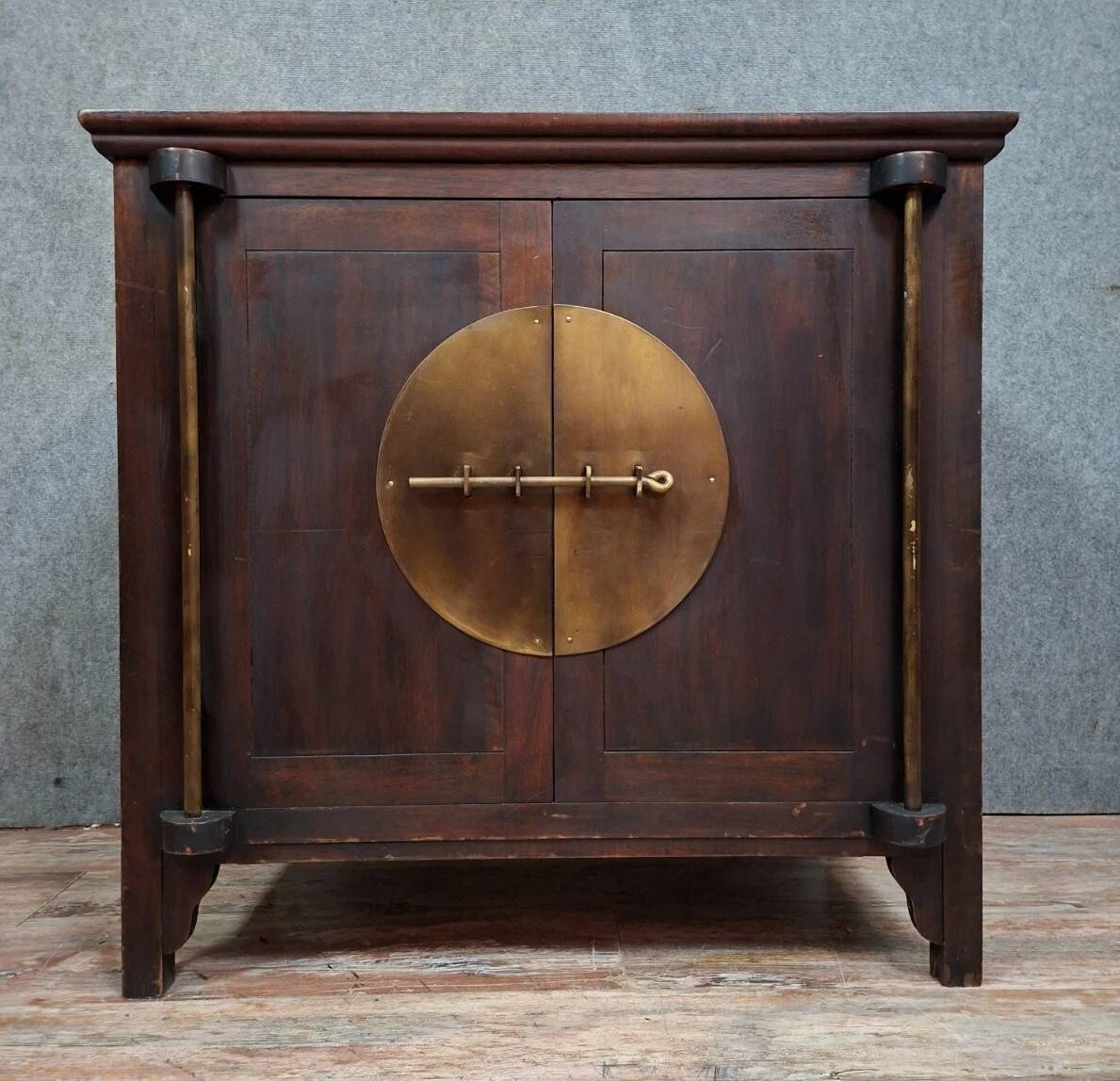 Buffet / antique Chinese wooden cabinet with brass fittings.