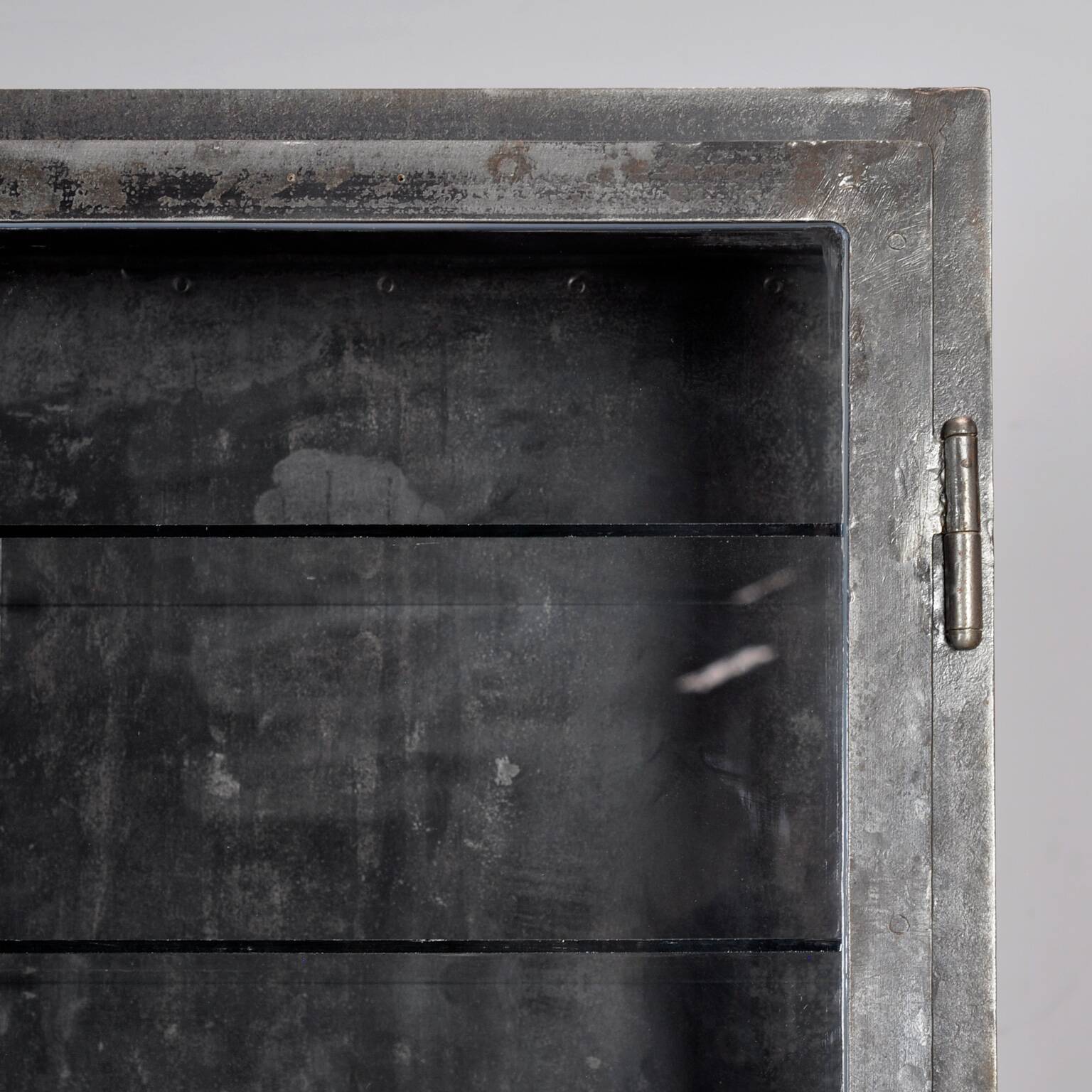 Polished iron medicine cabinet, 1930s