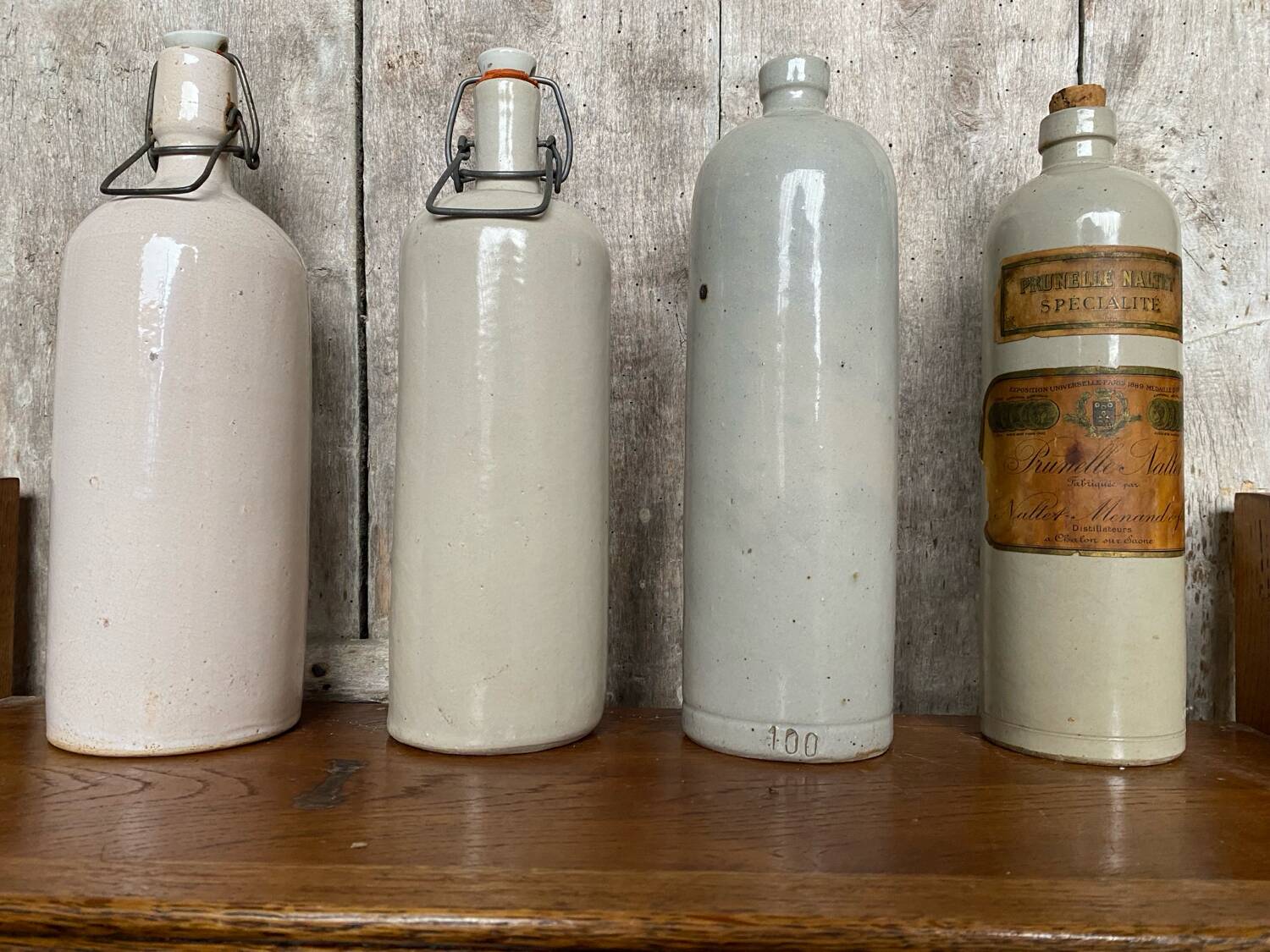 Set of 4 Old Grey Stoneware Bottles + Vintage Porcelain Stopper