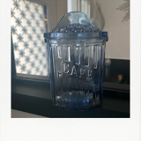 Old coffee pot in blue glass