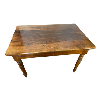 Walnut bistro table, feet turned.