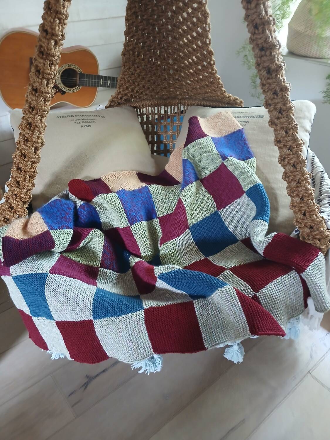 Hand knitted patchwork plaid