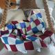 Hand knitted patchwork plaid