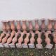 About twenty terracotta balusters from Castelnaudary