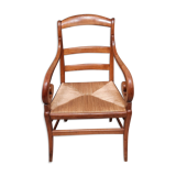Rustic straw armchair with butts