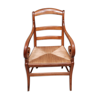 Rustic straw armchair with butts