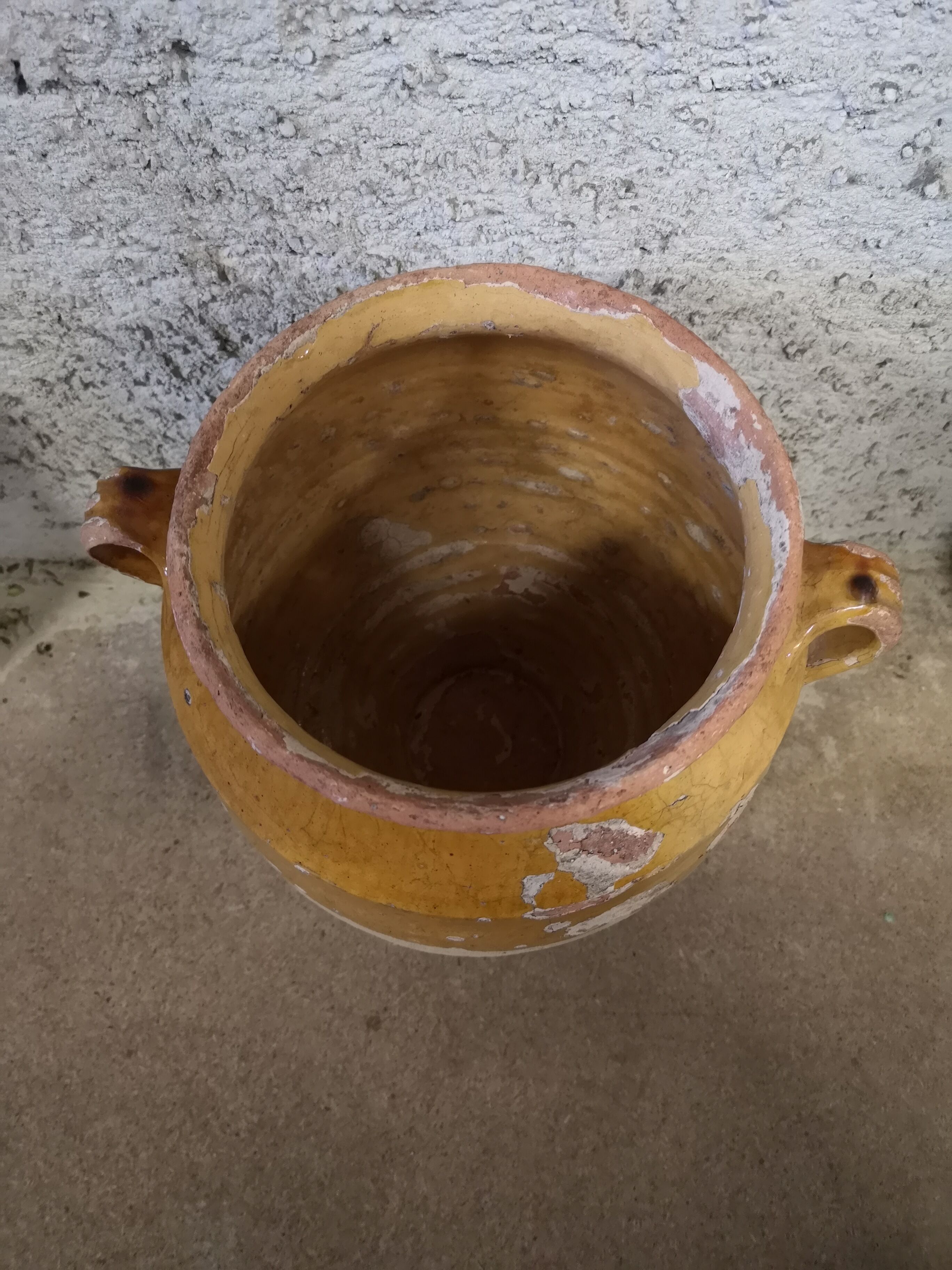 Ancient yellow sandstone pot