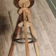 Wood stool with tripod screws