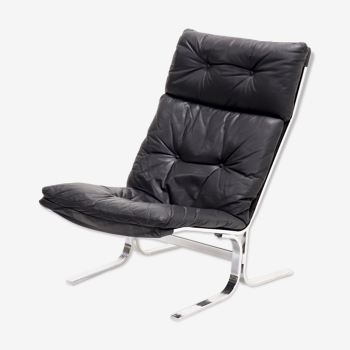 Fauteuil en cuir noir et chrome 1970