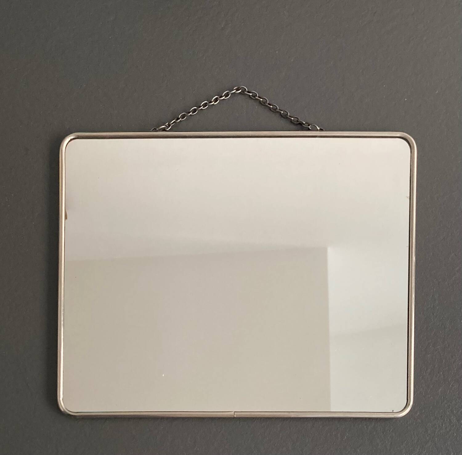 Vintage barber mirror and chain