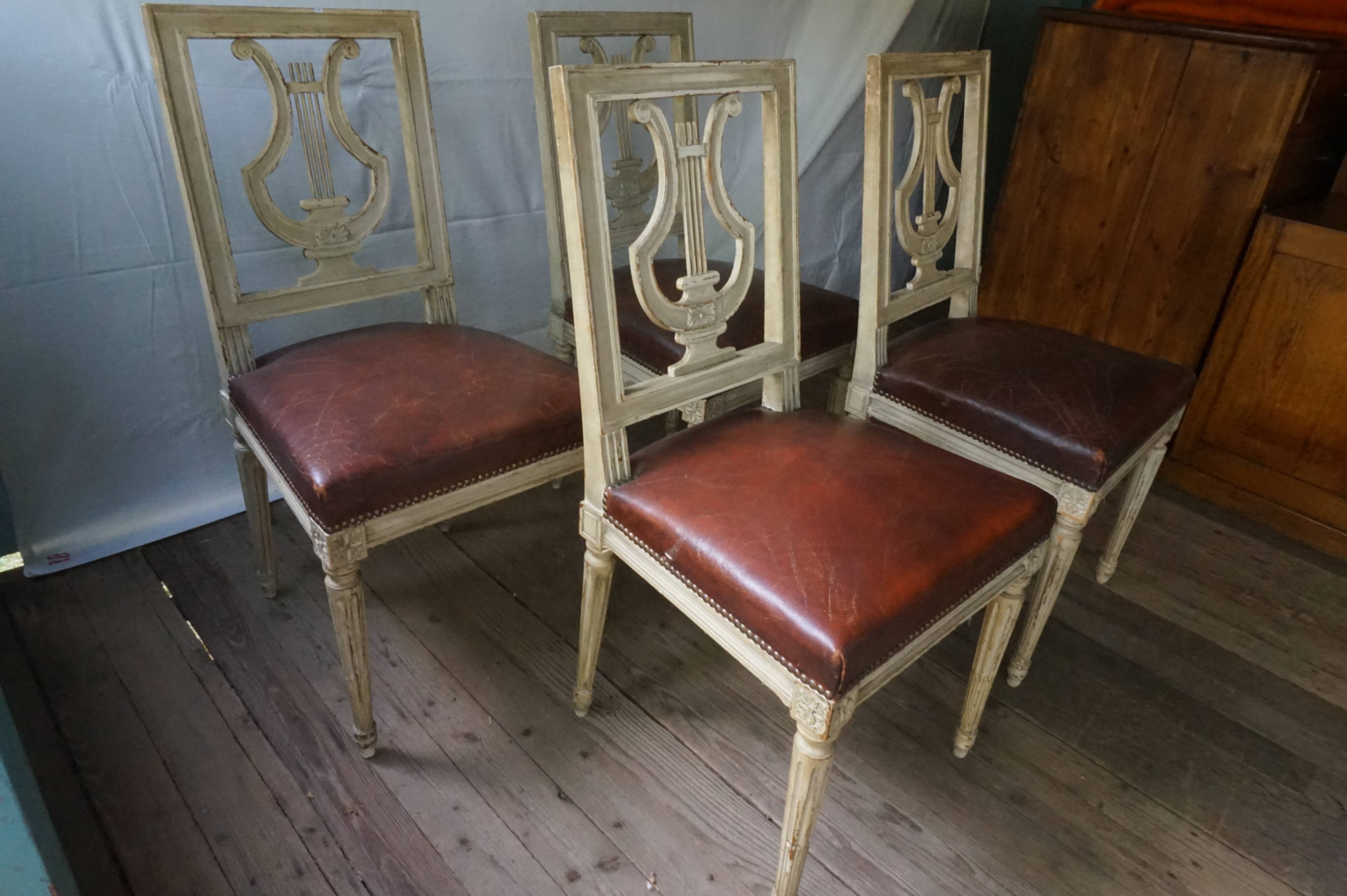 Suite de 4 chaises « lyre »