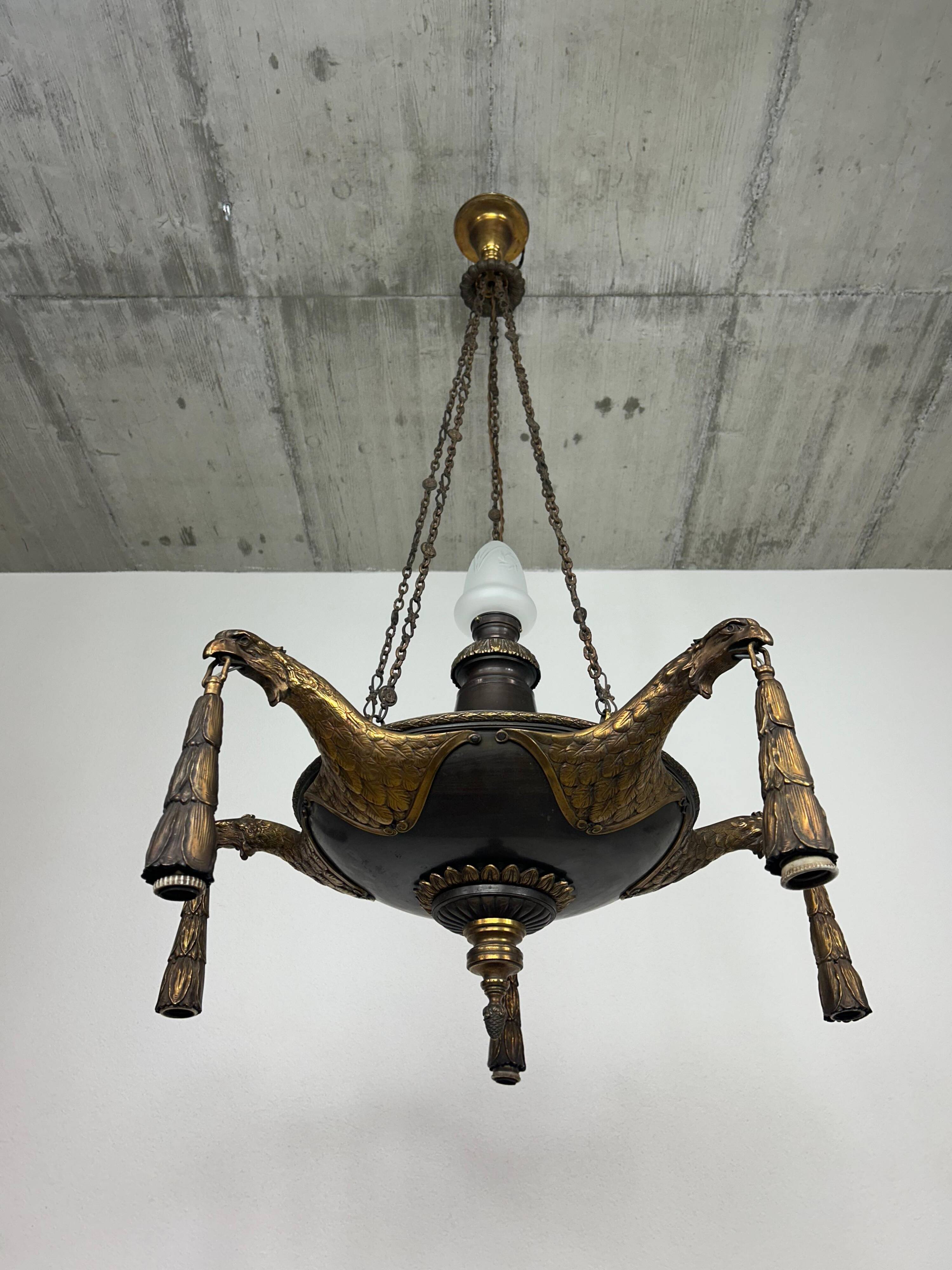 Extraordinary Art Deco chandelier with bronze eagles.