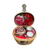 Chinese porcelain tea set in its portable wicker basket