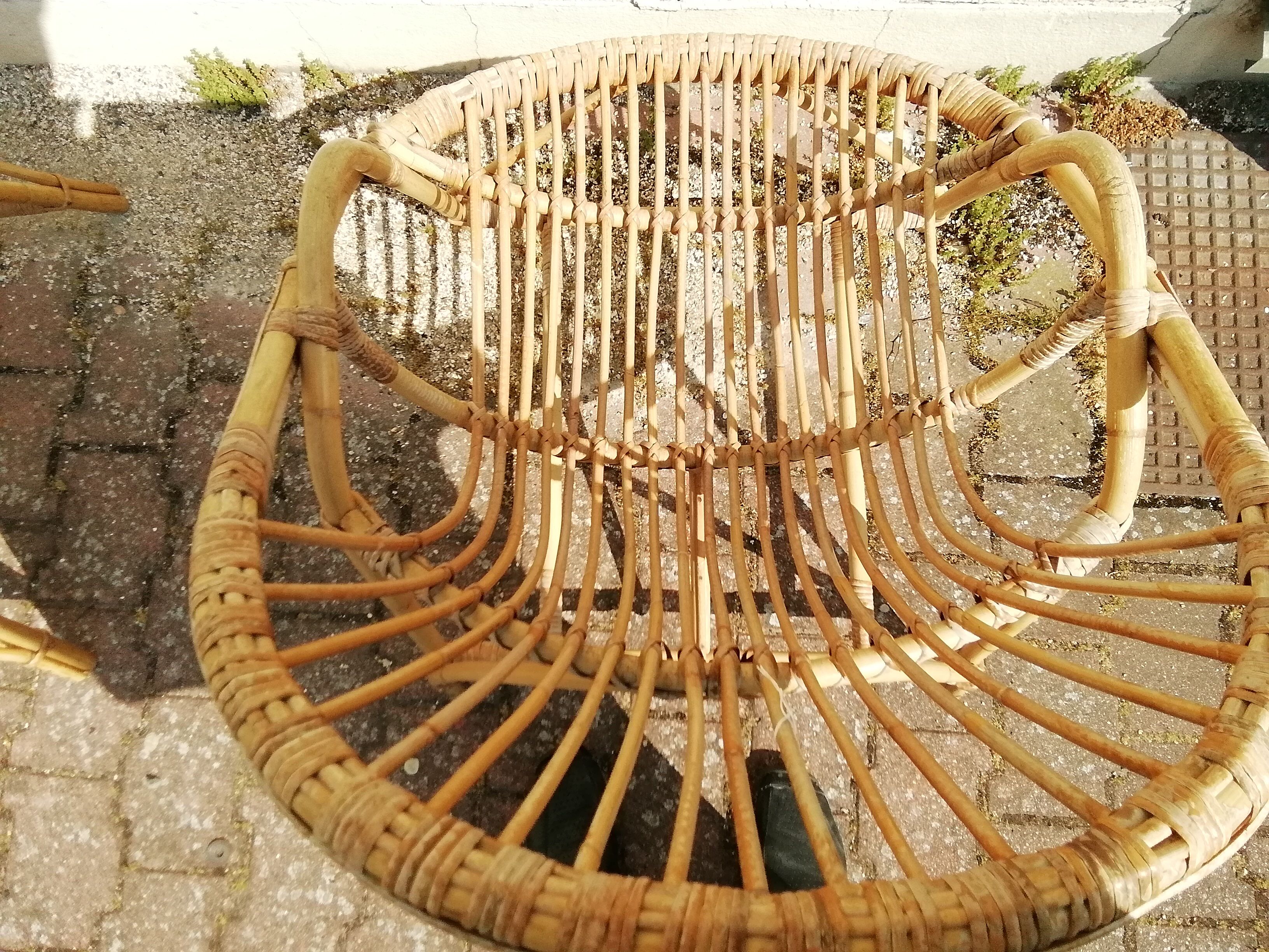 Vintage rattan armchair pair
