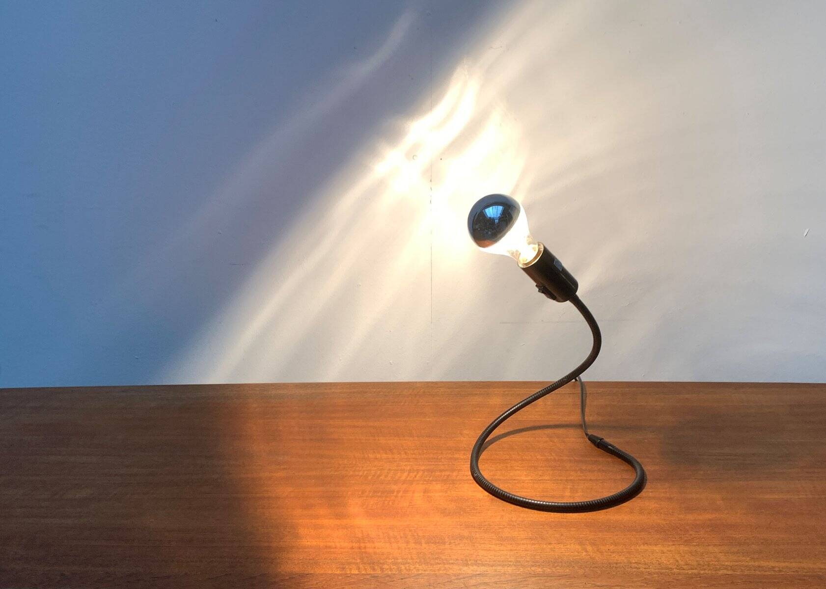 Lightworm minimalist table lamp by Walter Schnepel for Tecnolumen.