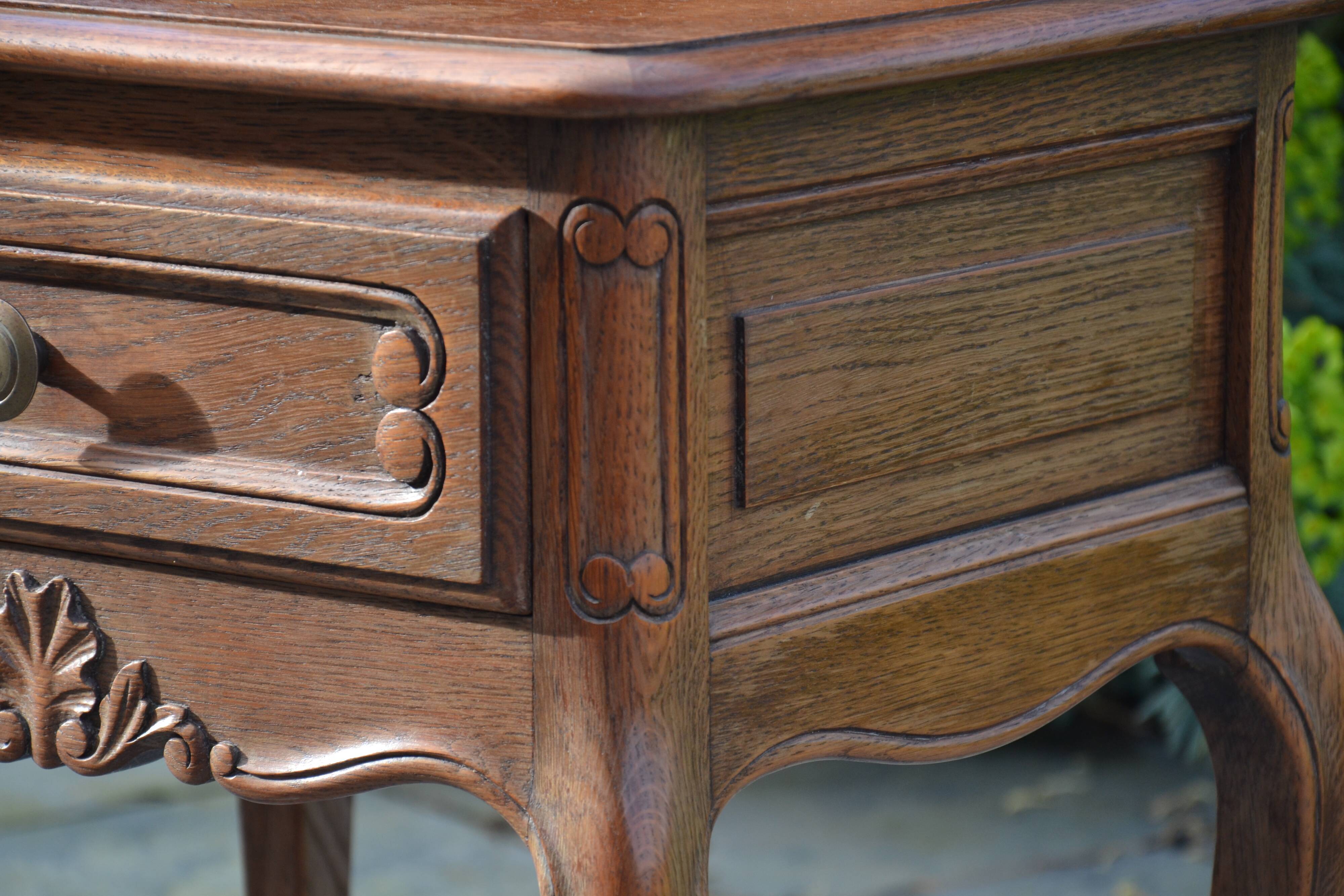 Two oak bedside tables.
