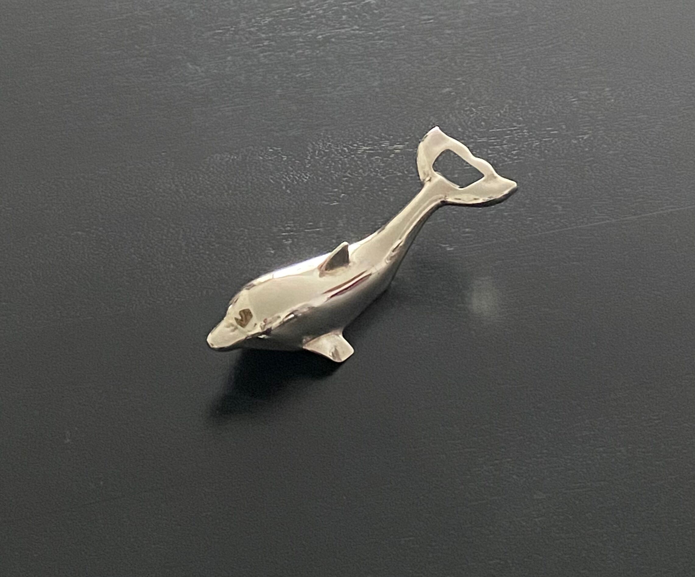 Bottle opener dolphin shape