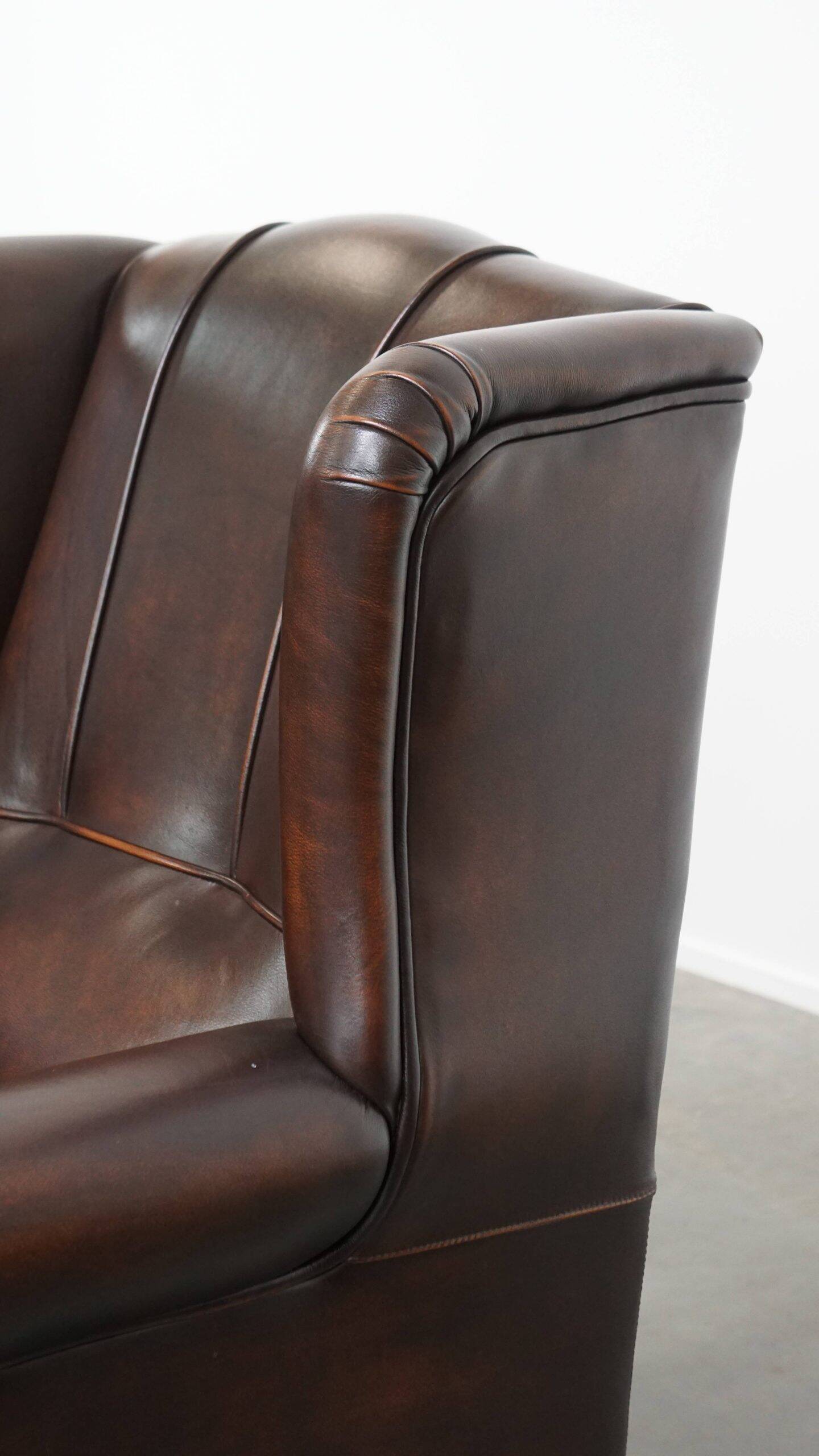 Comfortable and very beautiful set of 2 cow leather wingback armchairs in English style