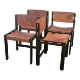 Set of four Brutalist chairs in black beechwood and saddle leather, Netherlands 1970