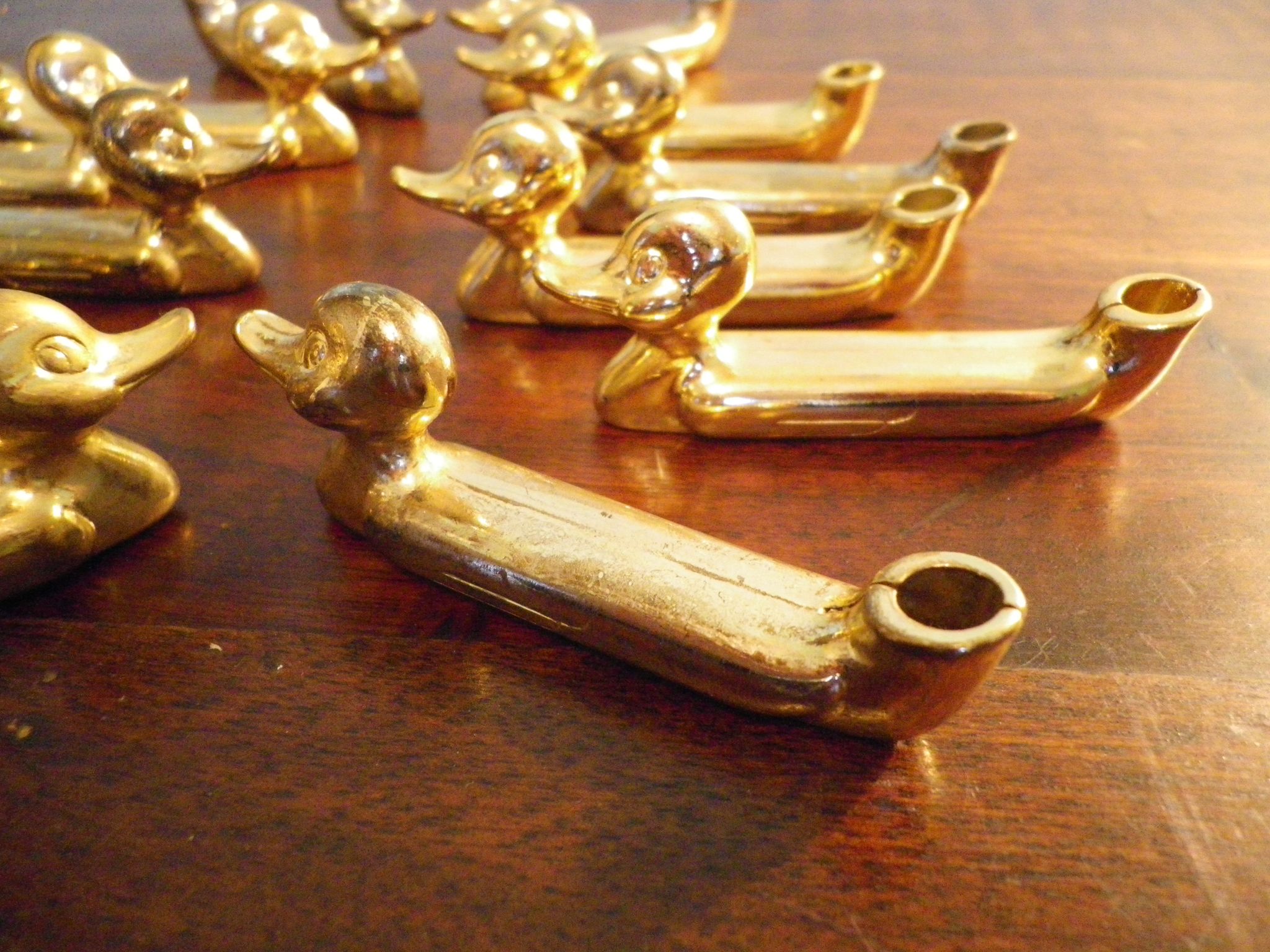 Box of 12 knife holders in silver metal, shape of canrds, 60s