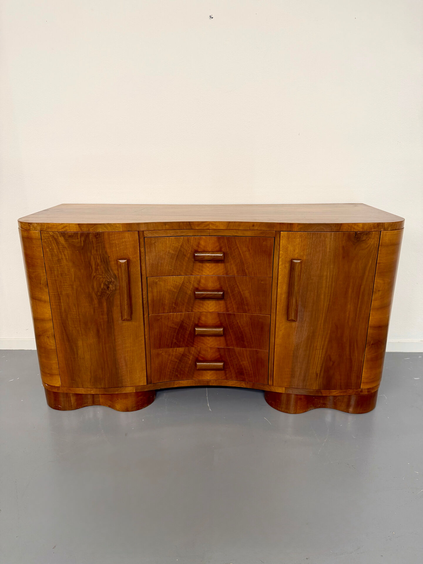 Antique walnut sideboard in Art Deco style from the 1930s.