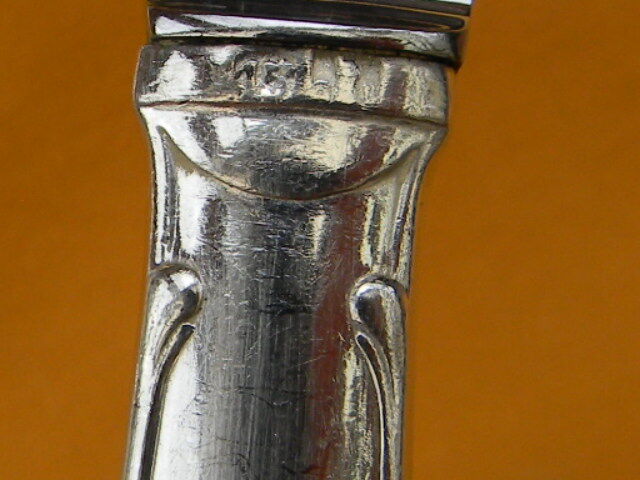 Set of 12 cheese or fruit knives handle in silver metal.