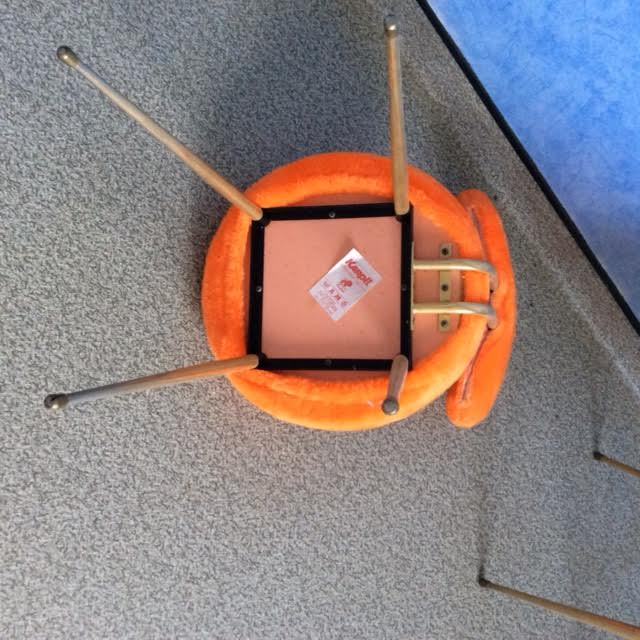 Old armchair moumoute orange