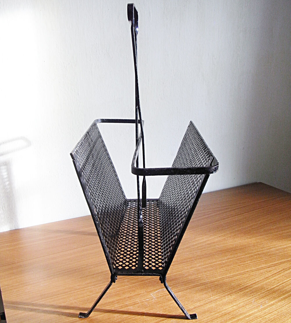 Black magazine door Mathieu Mategot in perforated metal 50s