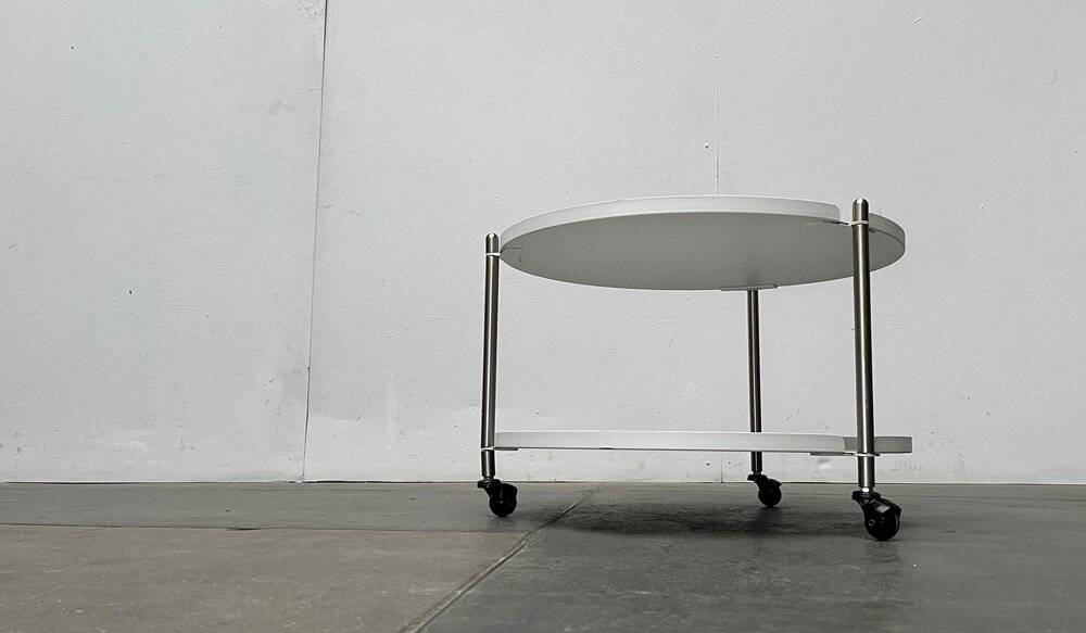 Minimalist Thrill metal coffee table or side table with wheels by Leitmotiv.