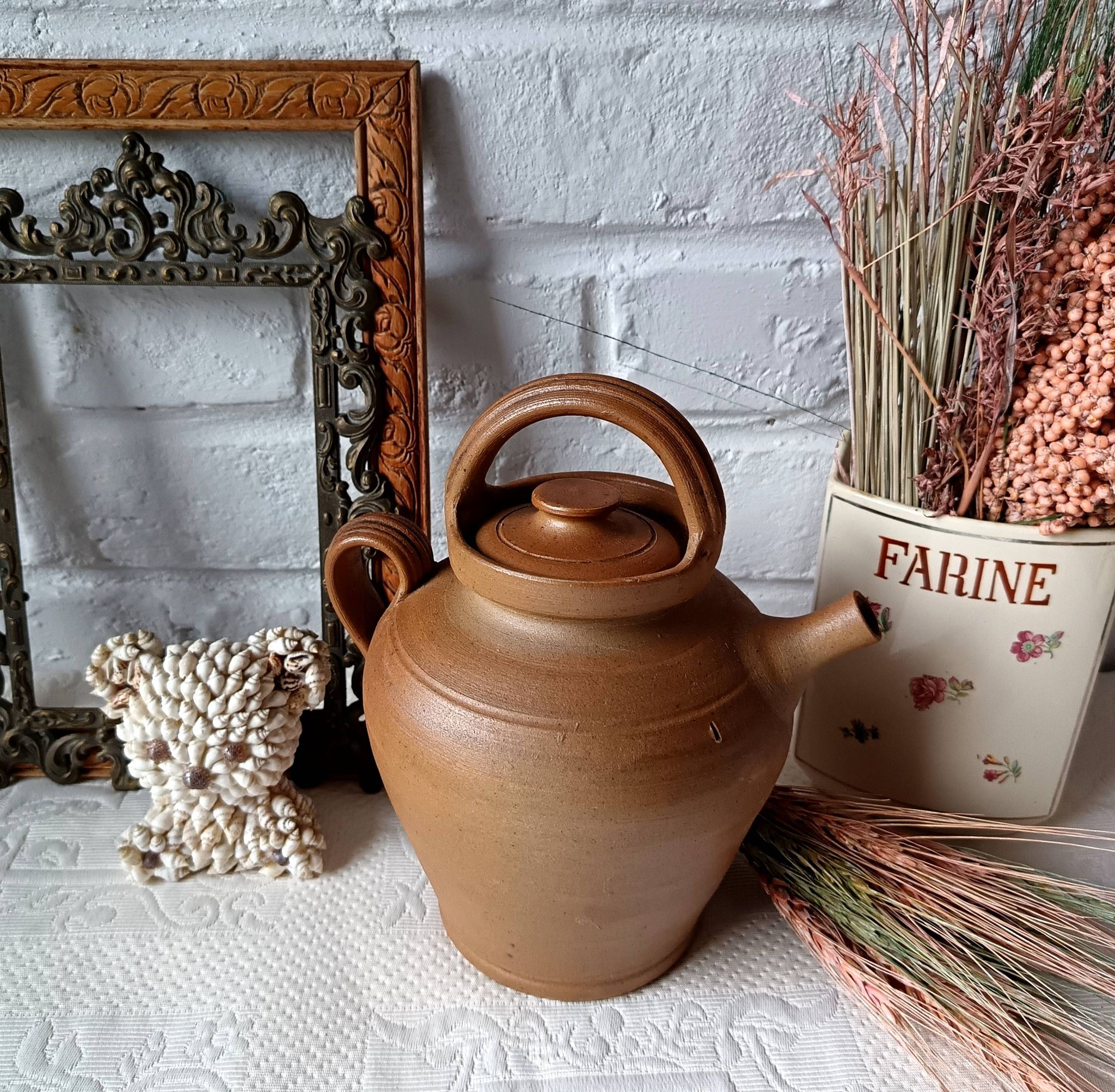 Vintage handmade brown glazed stoneware gargoulette.