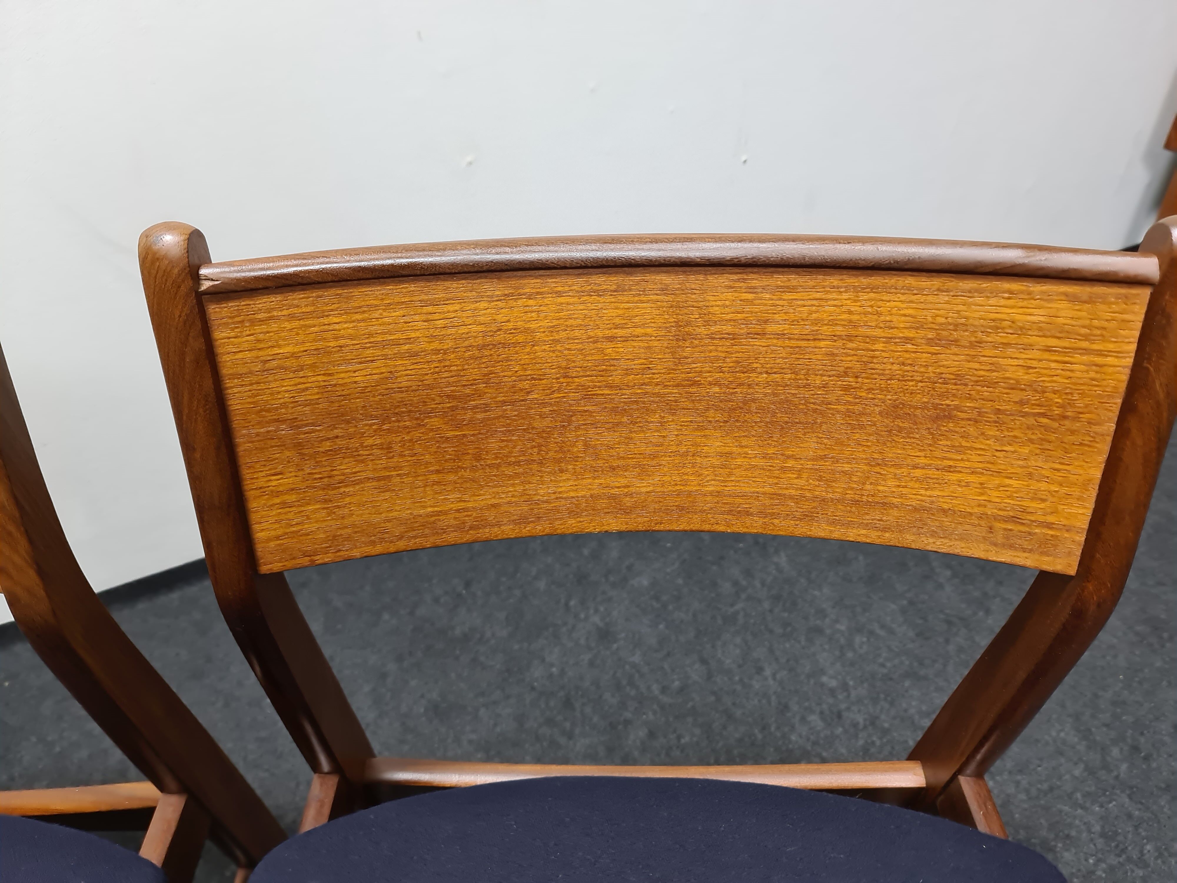 A pair of vintage teak dinning chairs