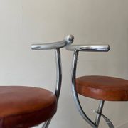 Bar stools in tubular chrome and tan leather, 1970s