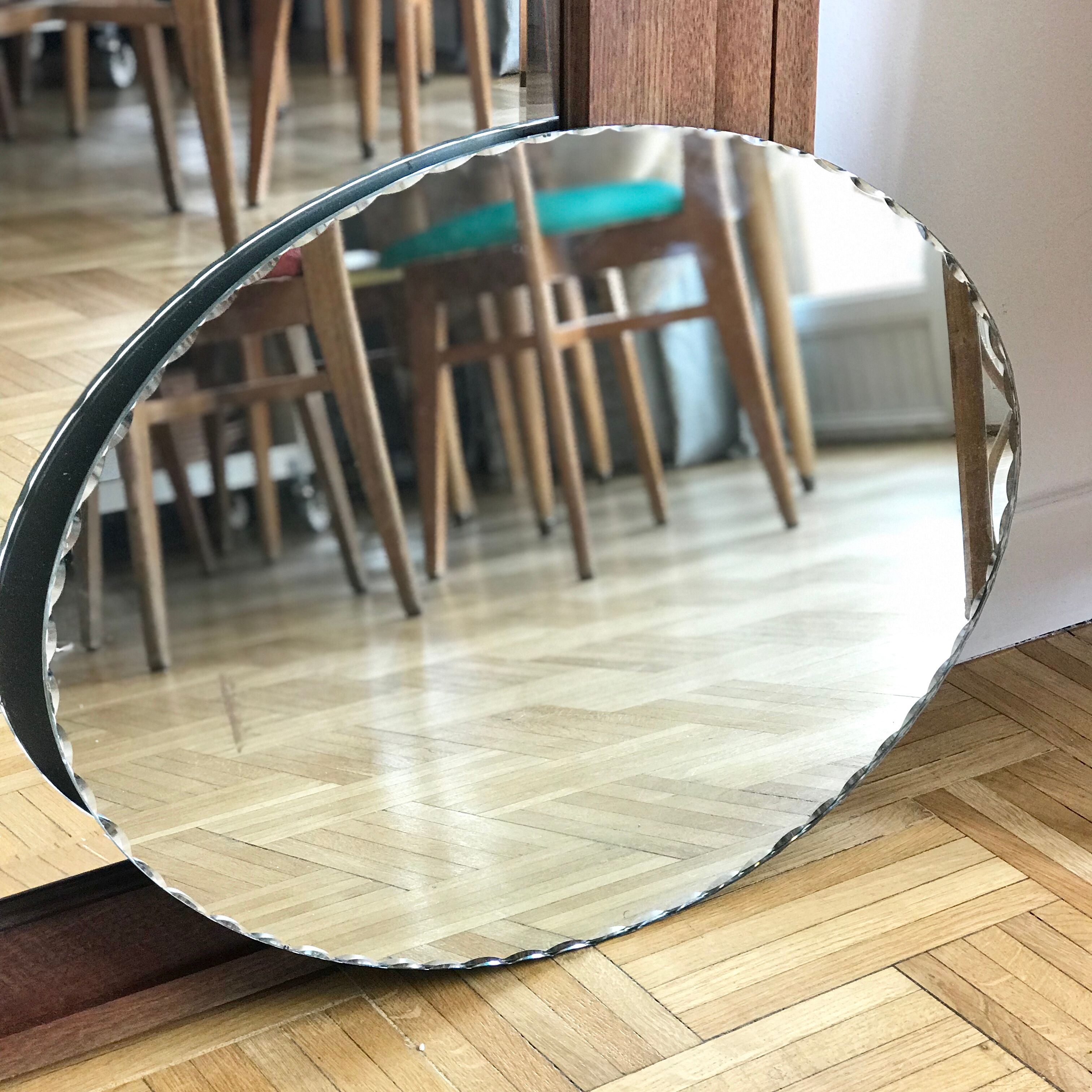 Oval mirror bevelled with removable metal media 43x60cm