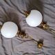 Golden metal and opaline glass globe
