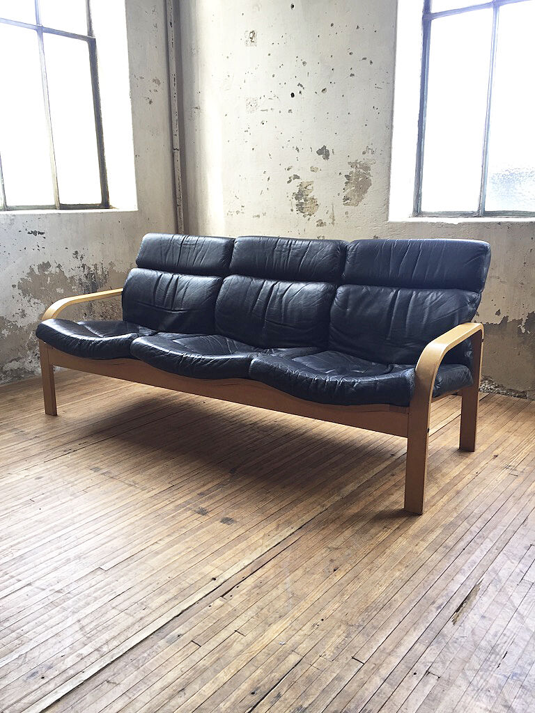 Danish sofa and armchairs curved wood and leather
