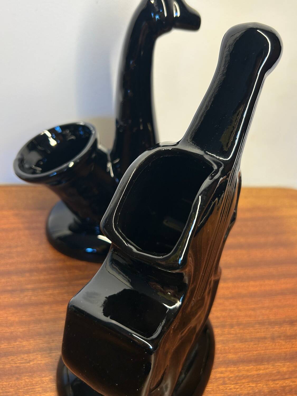 Black ceramic guitar and trumpet vases from the 60s